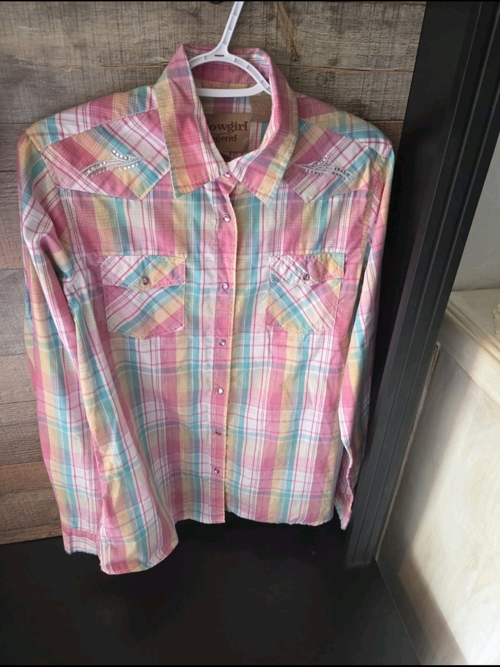 Cowgirl Legend western snap shirt featuring a multi-color pink, yellow, and turq